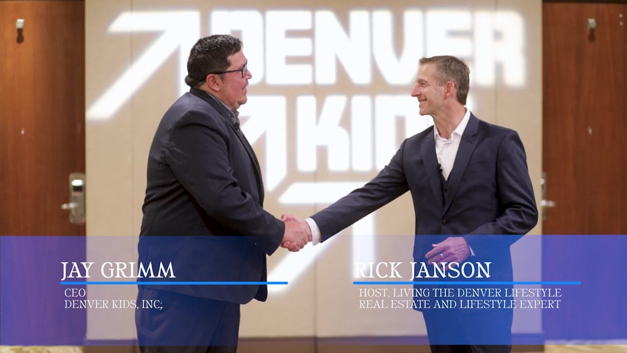 Denver Kids CEO Jay Grimm greeting Living the Denver Lifestyle host Rick Janson